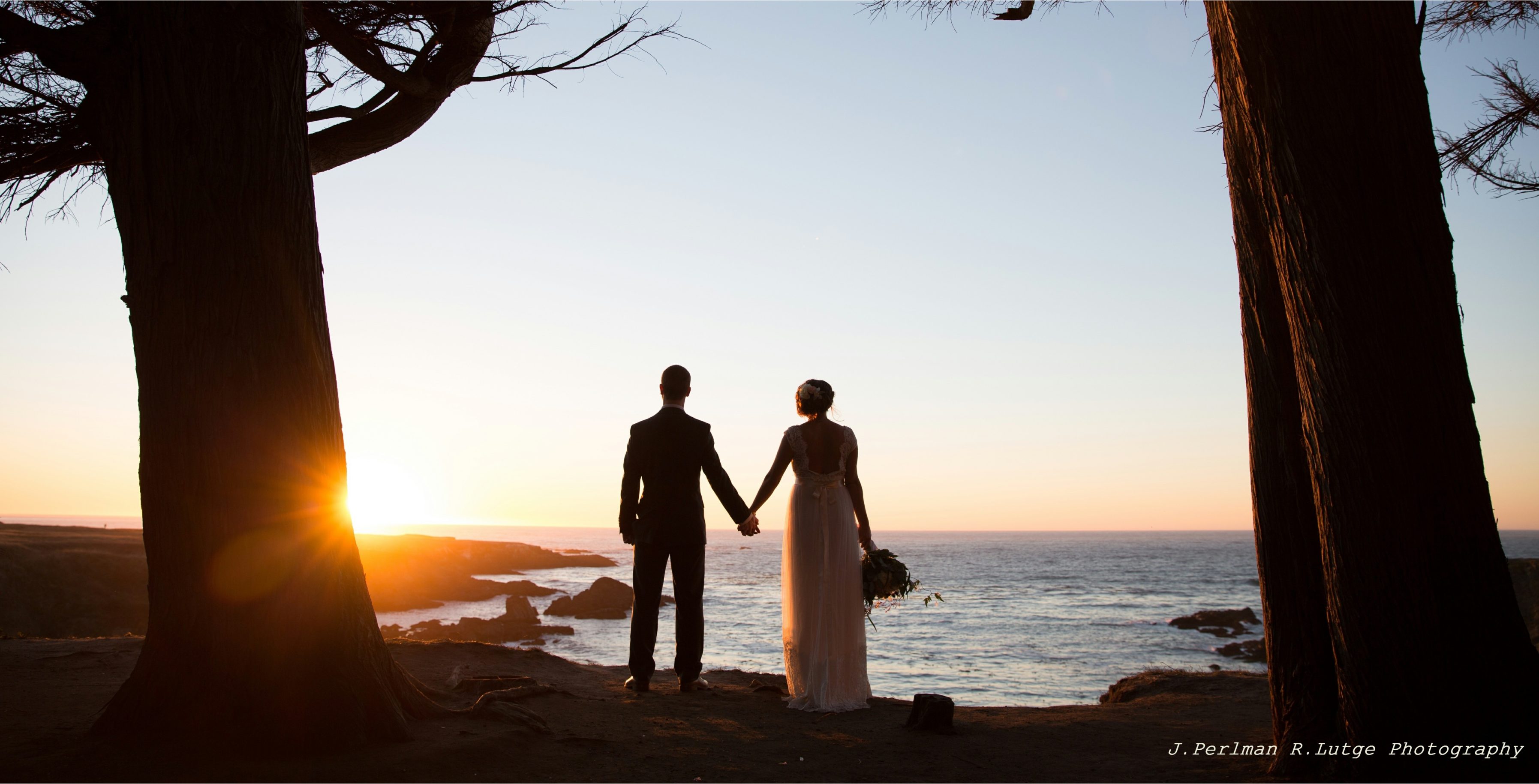 Their Elope Mendocino wedding ceremony completed, Danielle and Christopher watch the sun set from the bluffs.