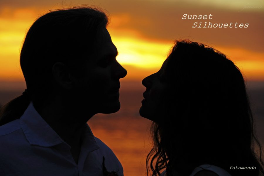 Sunset Silhouettes -- backlit by a red sky, Paula and Chris gaze deeply into each other's eyes.